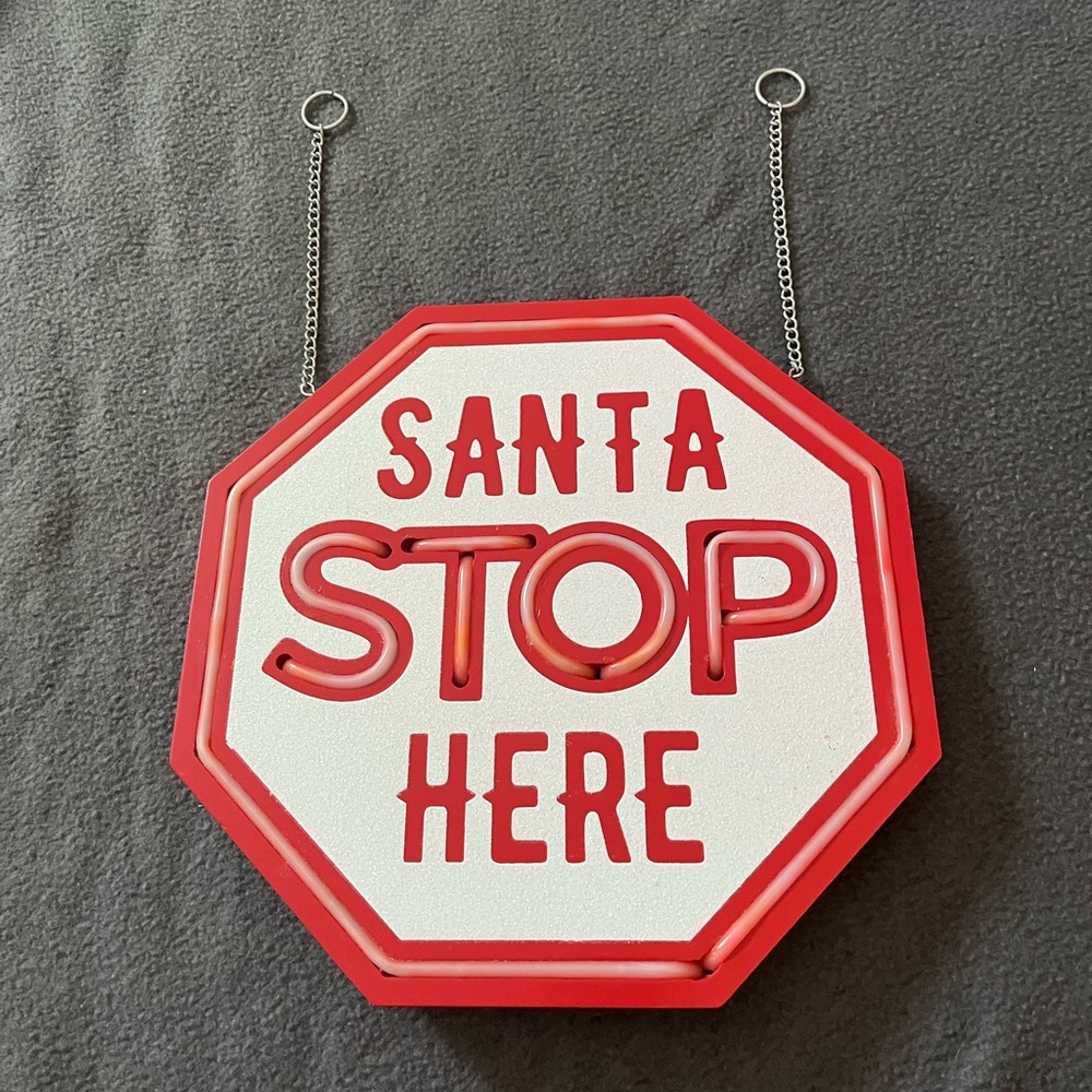 k&k interiors santa hanging sign